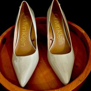Nude Calvin Klein patten leather pumps